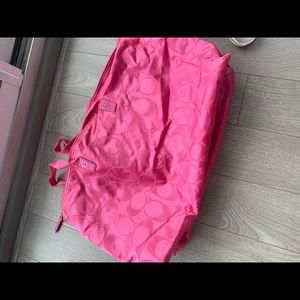 Hot pink large Coach duffel bag